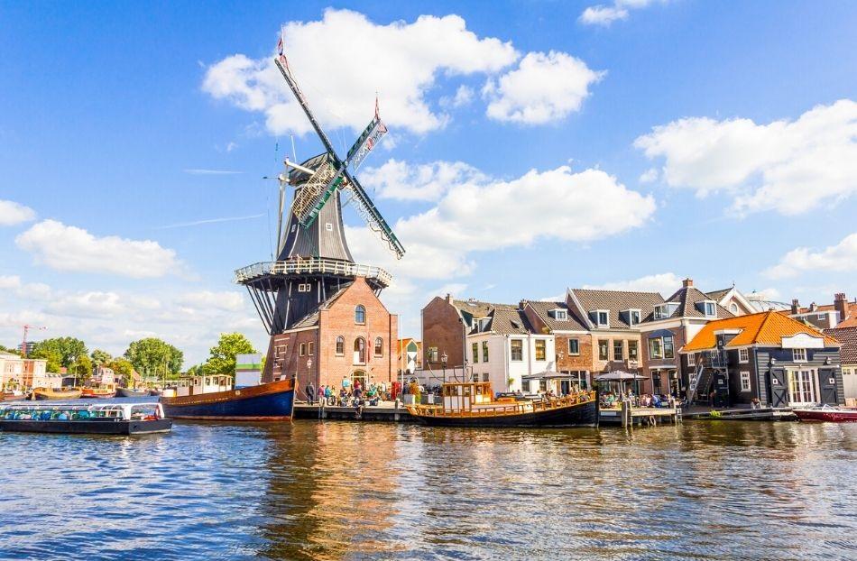 Haarlem windmill near canal river