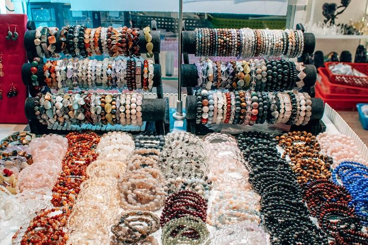 Hoi An market with bracelets and jewelry for sale