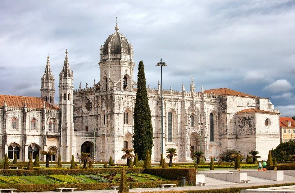 Exterior of Jeronimos Monastery on a cloudy day